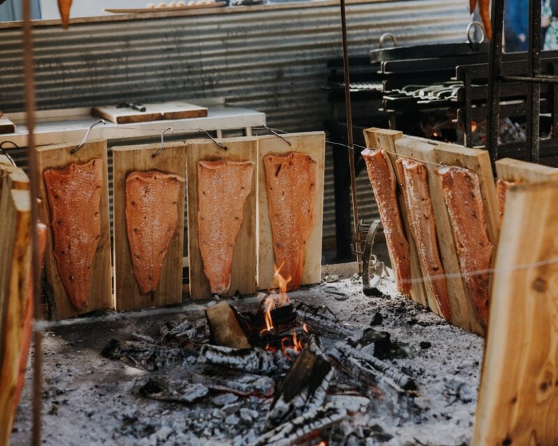 Fire-cooked salmon on cedar planks at Drovers Rest events venue